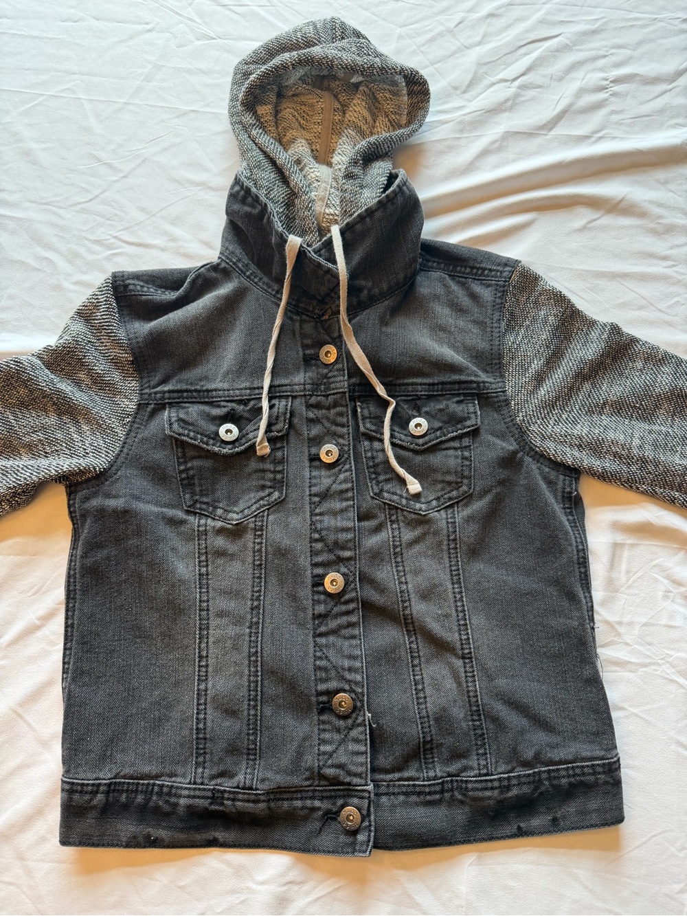 Mudd cream and black knit sweater label visible